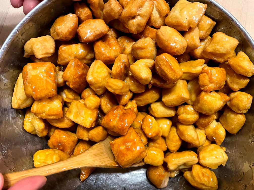Fried dough mixed with honey